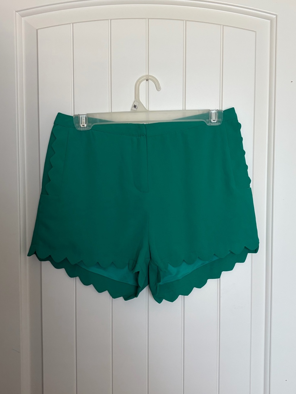 green scalloped shorts